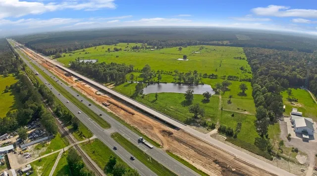 a view of swimming pool from a balcony