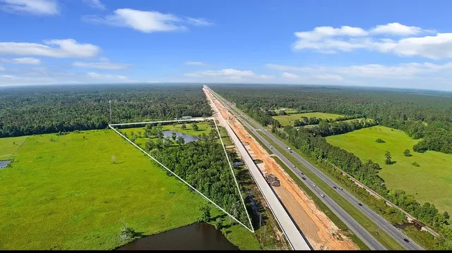 a view of swimming pool from a balcony