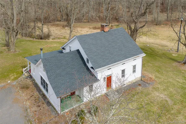 a terrace with a table and chairs