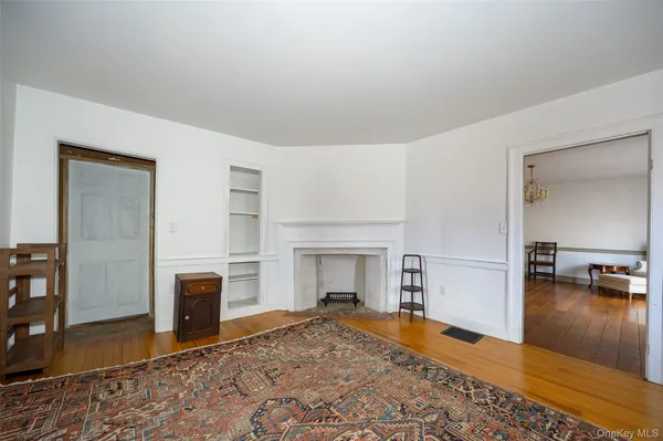 a view of livingroom with furniture and fireplace