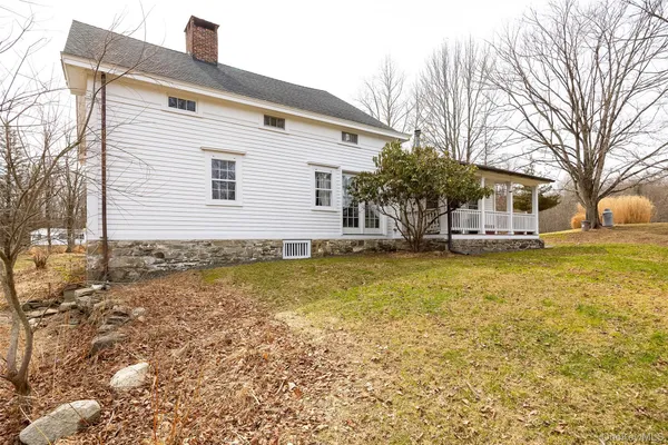 a view of a house with swimming pool