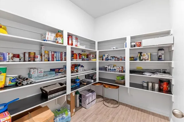 a table and chairs in front of a house