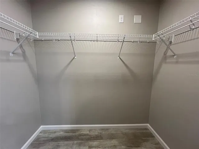 a view of a room with racks on the wall