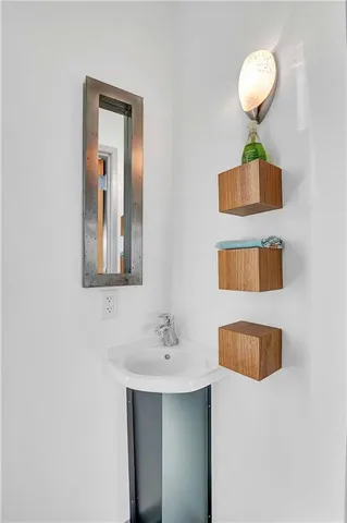 a bedroom with bed and a window