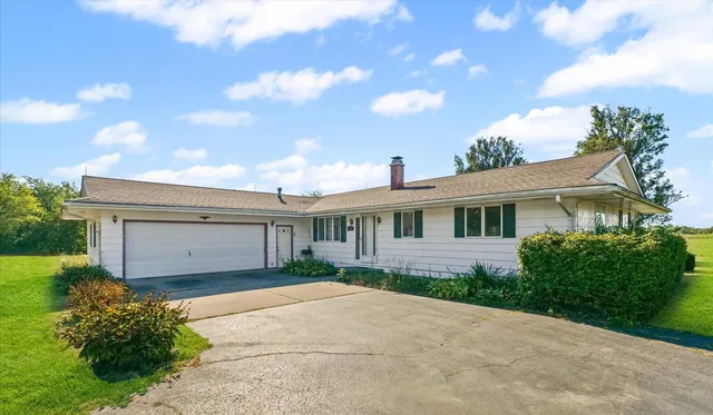 a view of a house with a garden
