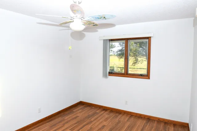 a view of a hallway with a window