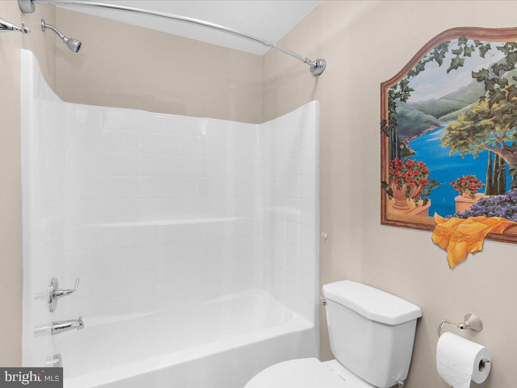 4404 Pine Top Road Madison, MD 21648 - Photo 58 of 68 a white toilet sitting next to a bath tub