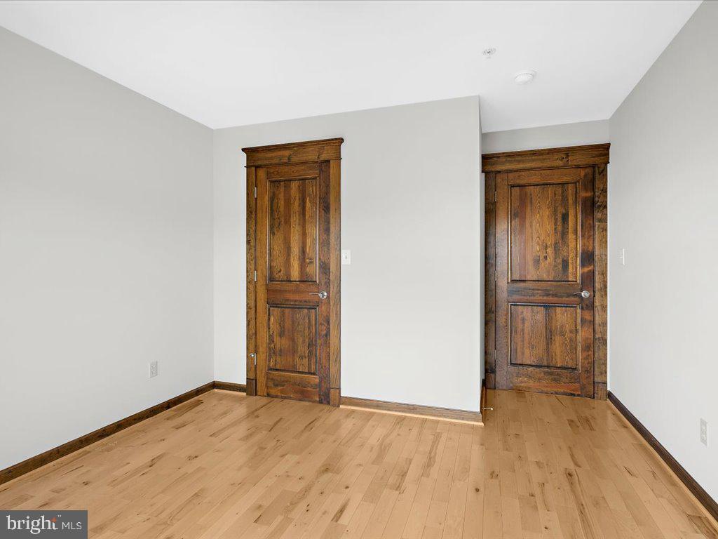 4404 Pine Top Road Madison, MD 21648 - Photo 60 of 68 wooden floor in an empty room
