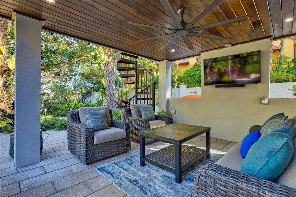 506 58th Street Holmes Beach, FL 34217 - Photo 89 of 95 a outdoor living space with furniture and garden view