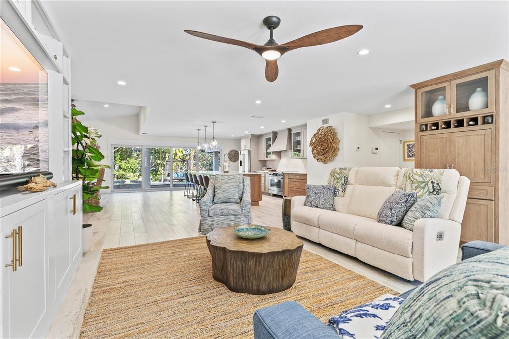 506 58th Street Holmes Beach, FL 34217 - Photo 10 of 96 a living room with furniture and kitchen view