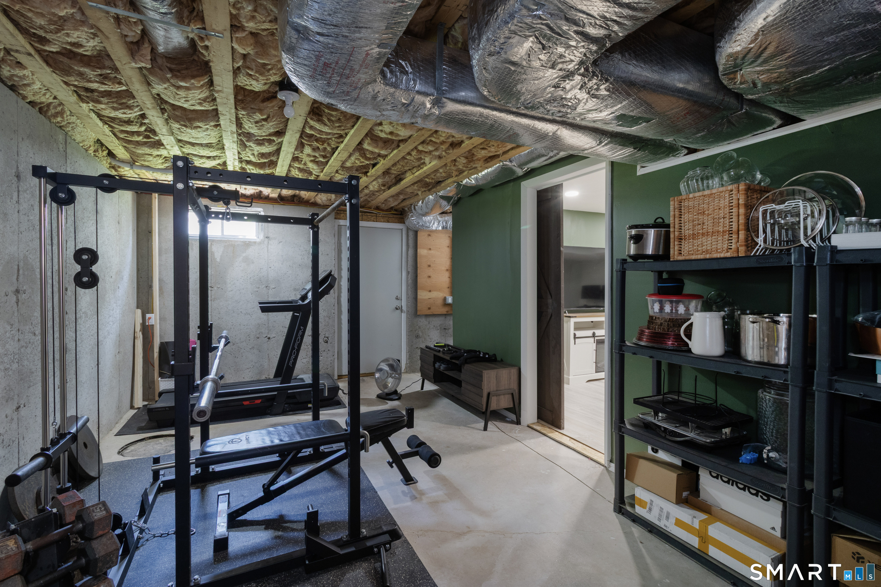 656 Bartholomew Road, Unit 656 Middletown, CT 06457 - Photo 26 of 27 a view of a room with gym equipment
