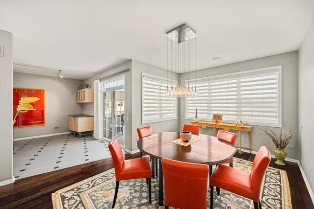 a living room with furniture a rug and a large window