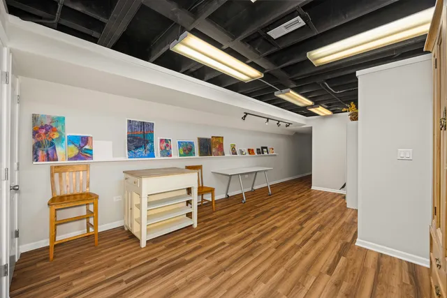 a room with furniture and a wooden floor