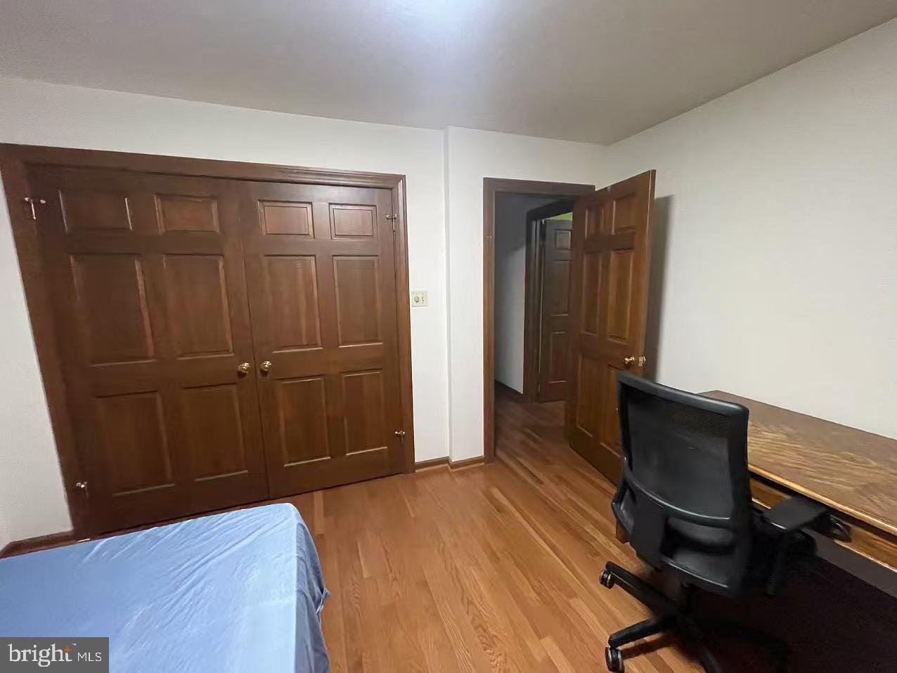 8306 Osage Terrace Adelphi, MD 20783 - Photo 4 of 6 a view of bedroom with wooden floor