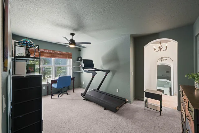 a bathroom with a bathtub and a window