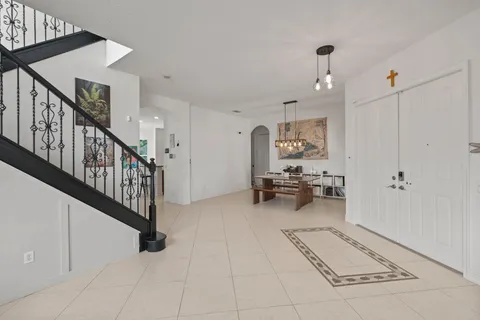 a reading room with furniture and window