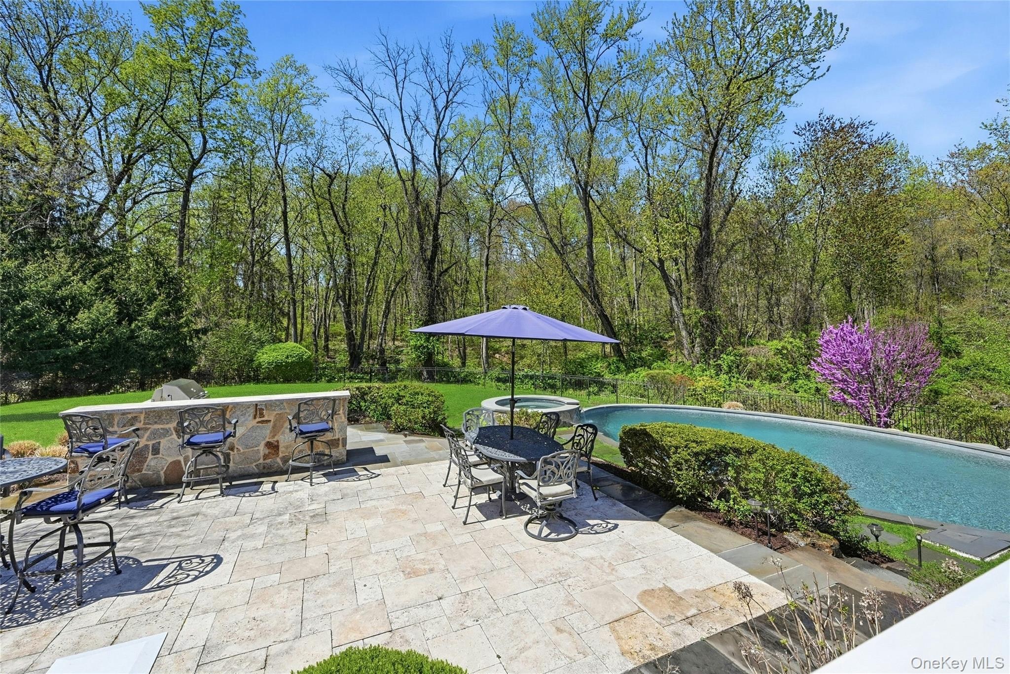 5 Mill Road Lloyd Harbor, NY 11743 - Photo 43 of 49 a view of backyard with outdoor seating and trees