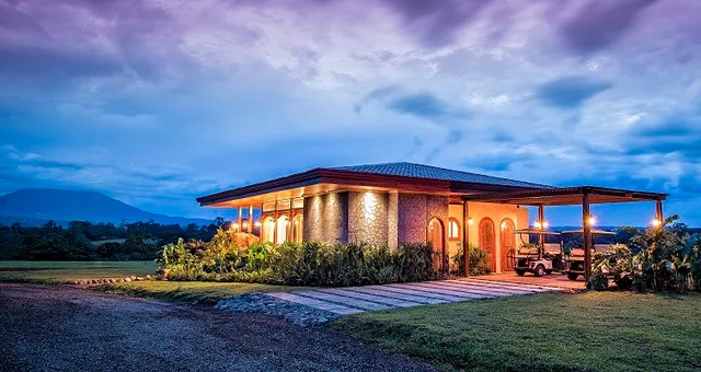 a view of a basketball area with a big yard