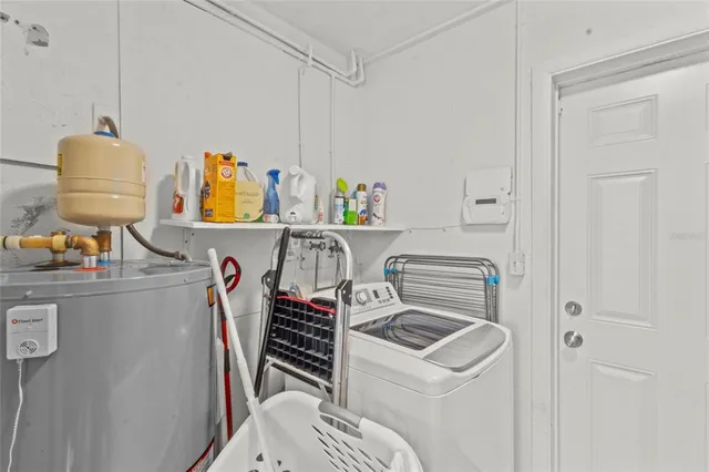 a bedroom with a bed and furniture