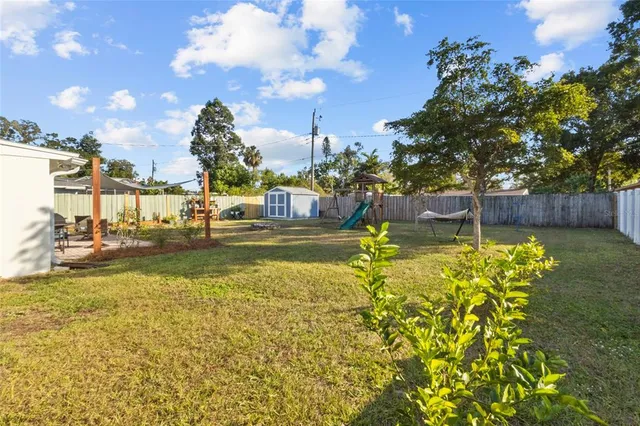 a view of a swimming pool with a patio