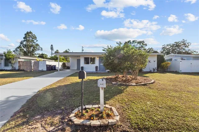 a swimming pool view with a outdoor seating