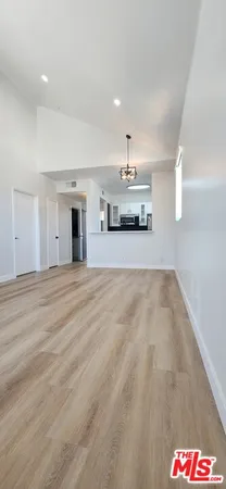 a view of a kitchen with a sink and a dishwasher