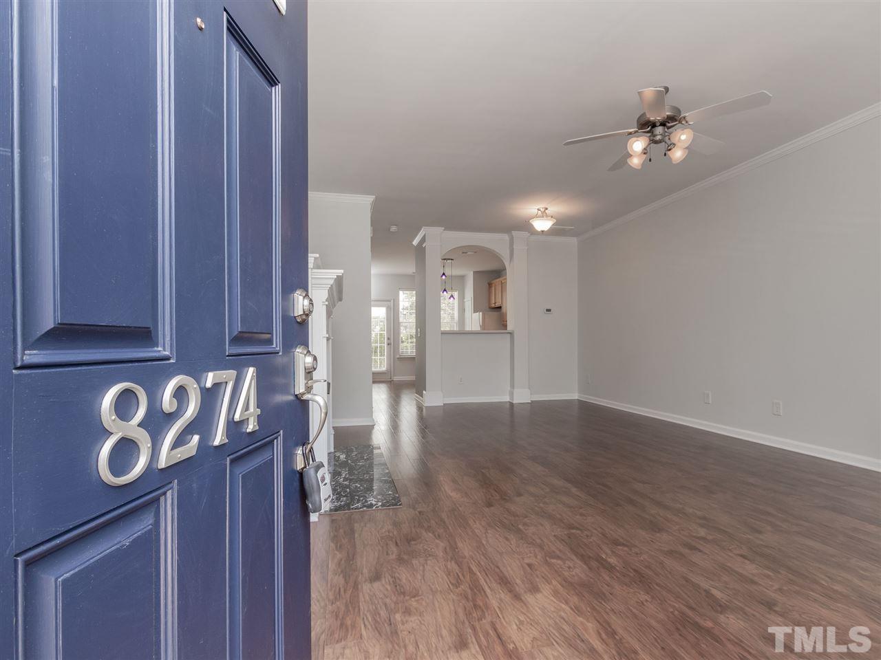 8274 City Loft Court Raleigh, NC 27613 - Photo 2 of 20 a view of an empty room with a kitchen