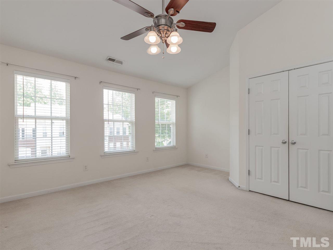 8274 City Loft Court Raleigh, NC 27613 - Photo 11 of 20 a view of an empty room with a window