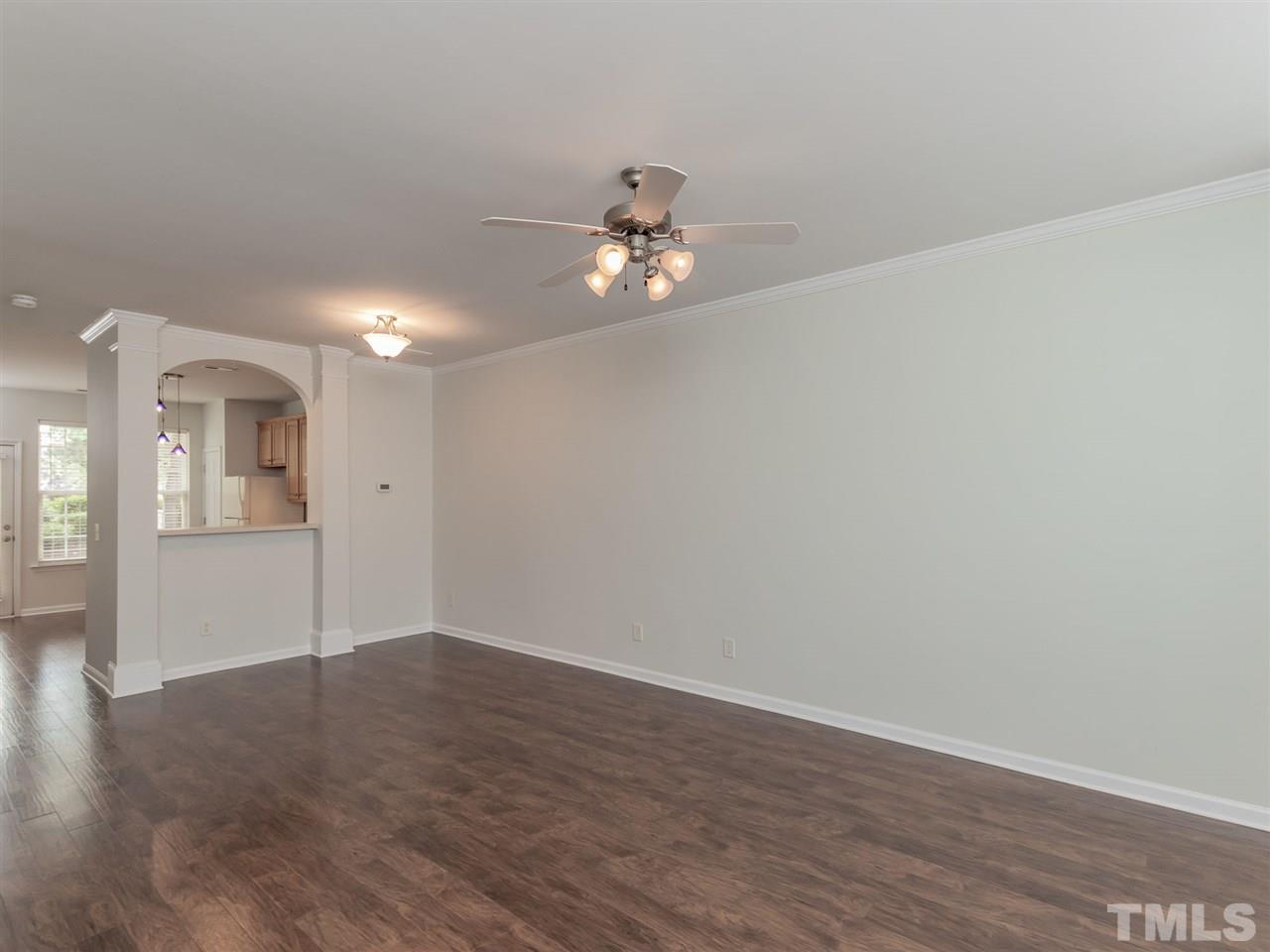 8274 City Loft Court Raleigh, NC 27613 - Photo 3 of 20 a view of empty room with wooden floor