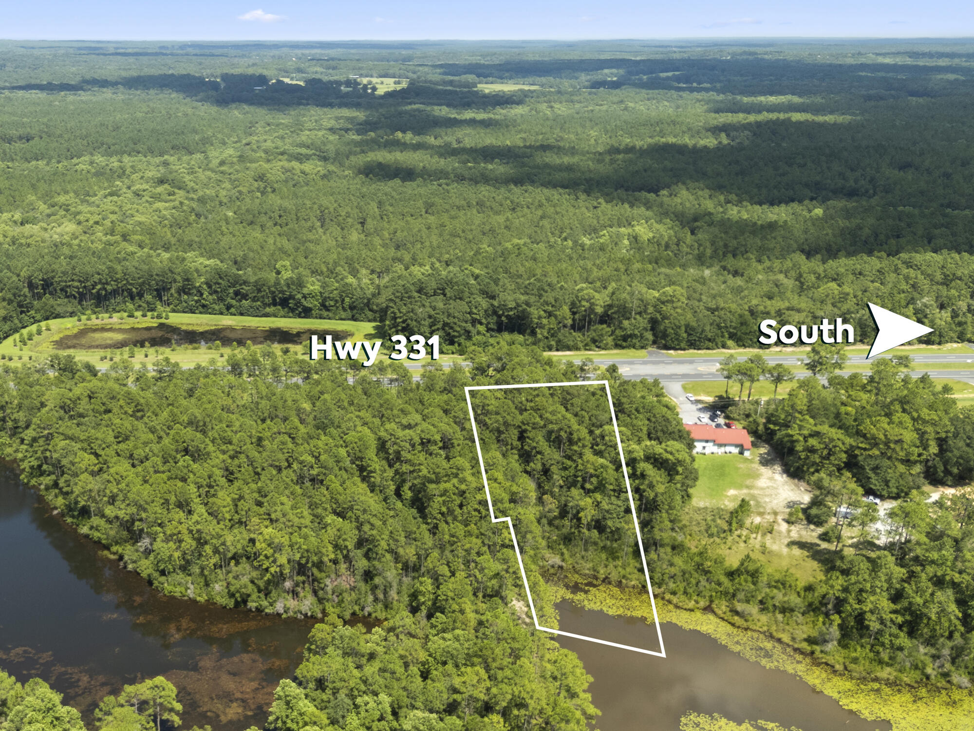 Lot 27 South Us Highway DeFuniak Springs, FL 32435 - Photo 11 of 12 a view of a field with an ocean view