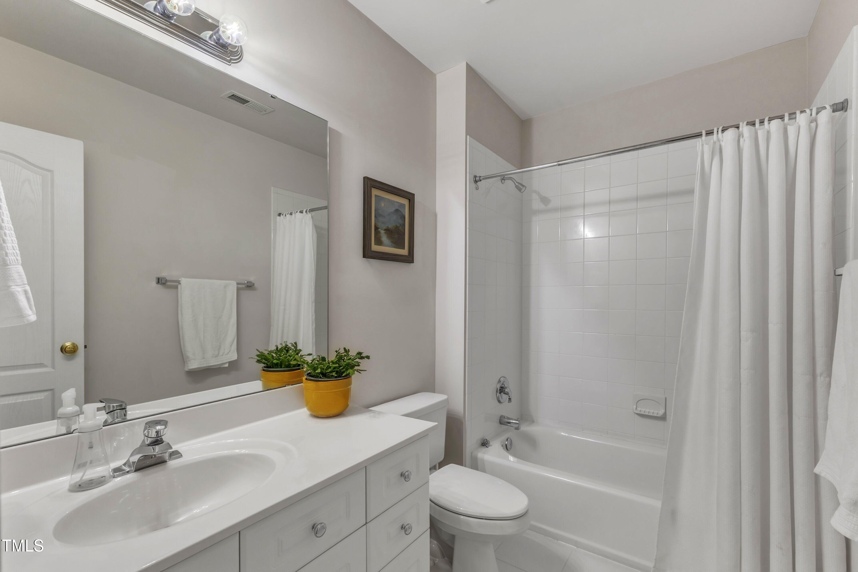 8704 Paddle Wheel Drive Raleigh, NC 27615 - Photo 32 of 50 Full Hall Bathroom