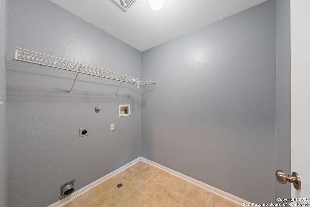 8411 Copperbluff Converse, TX 78109 - Photo 17 of 31 a bathroom with a shower