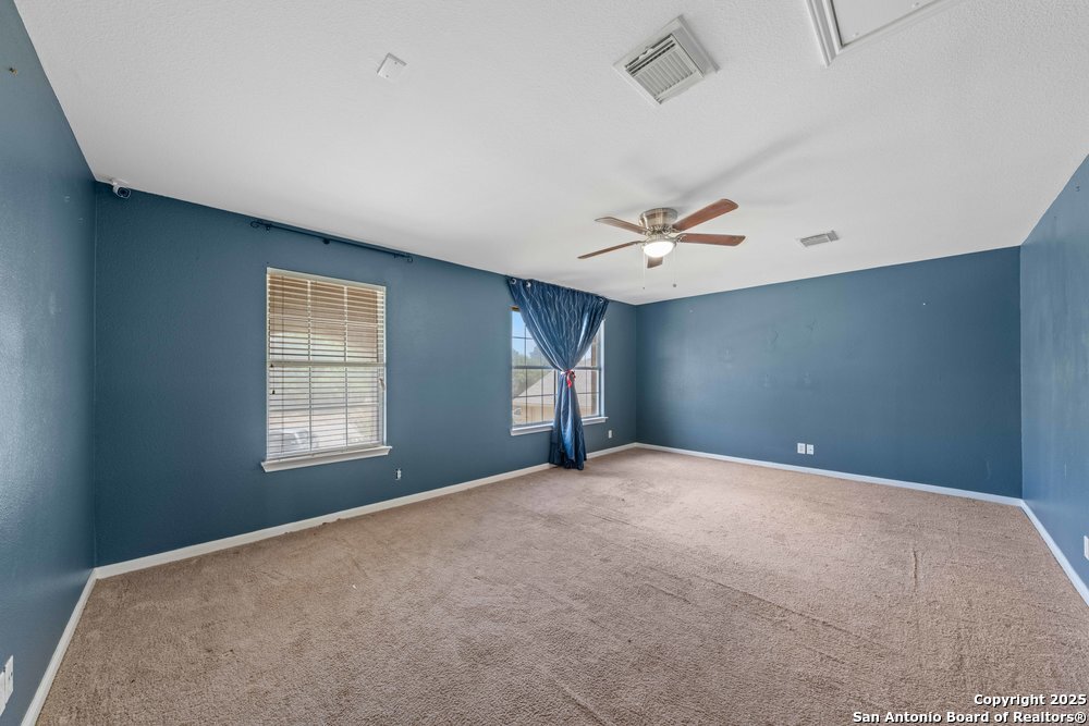 8411 Copperbluff Converse, TX 78109 - Photo 24 of 31 a view of an empty room with a window