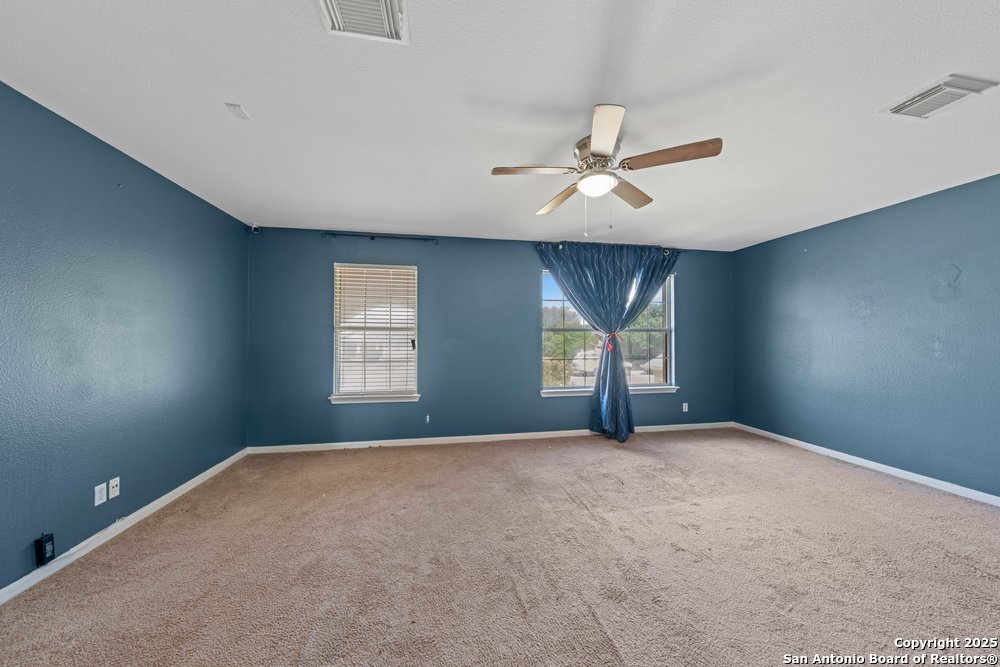8411 Copperbluff Converse, TX 78109 - Photo 26 of 31 a view of an empty room with a window
