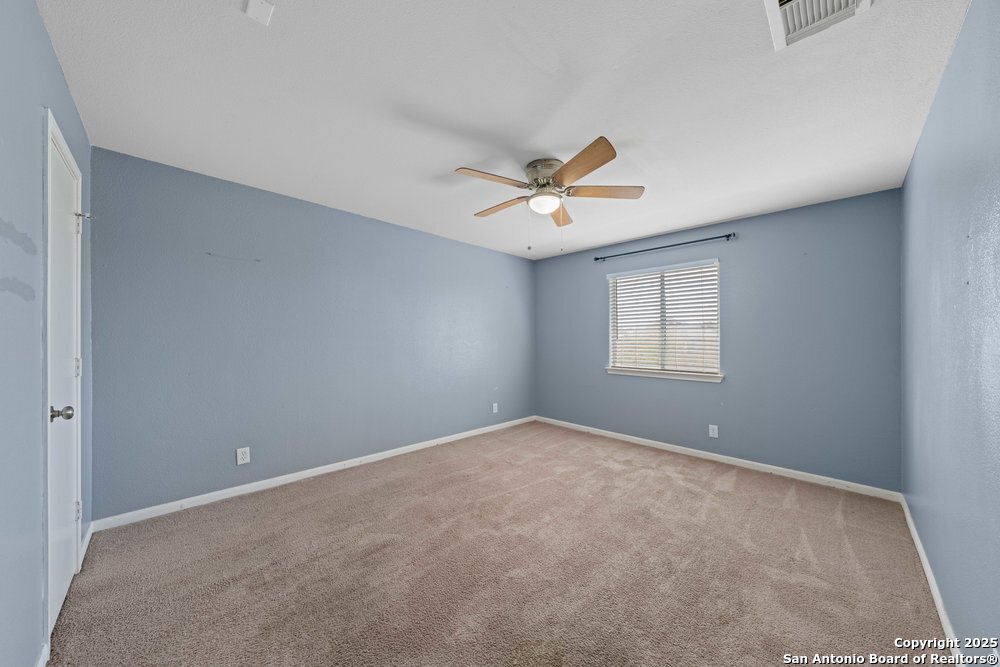 8411 Copperbluff Converse, TX 78109 - Photo 27 of 31 a view of an empty room with a window
