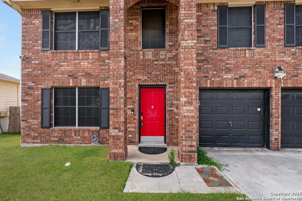 8411 Copperbluff Converse, TX 78109 - Photo 4 of 31 a front view of a house with garden