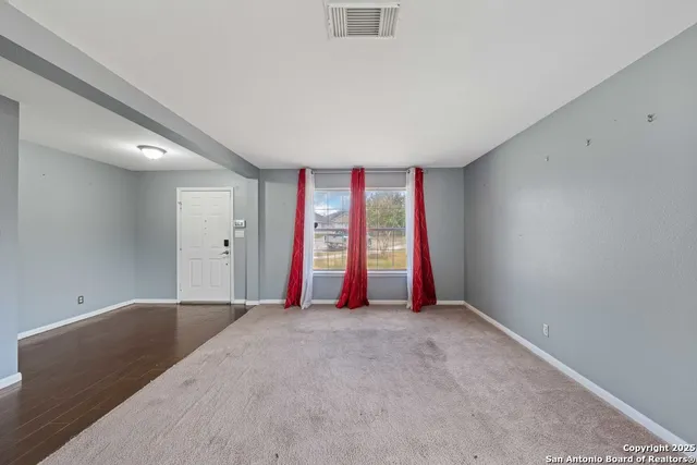 wooden floor and windows in a room