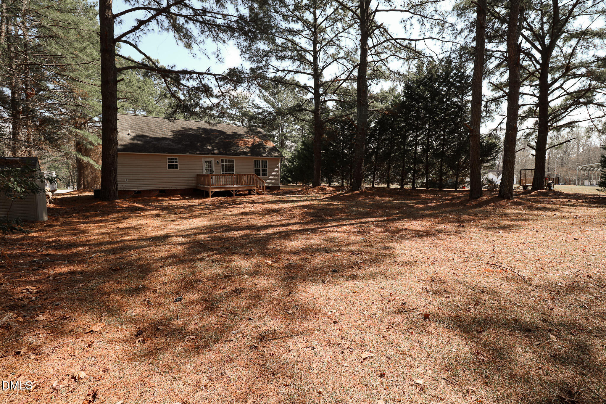 55 Edward Court Willow Spring, NC 27592 - Photo 12 of 25 a view of a yard with trees