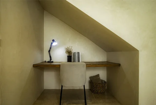 a bathroom with a toilet and a sink