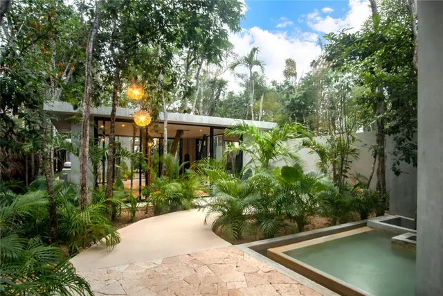 a view of a entryway door front of house