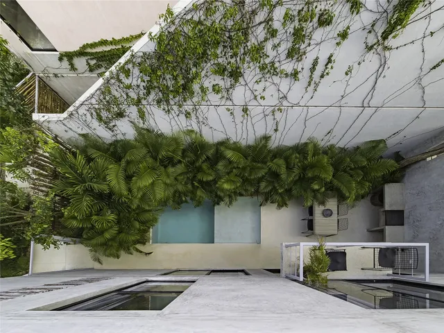 a view of a bench in a backyard