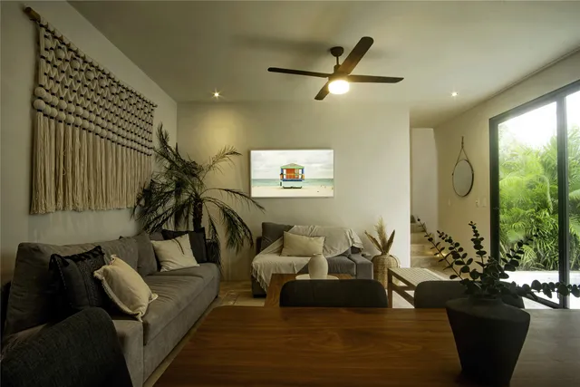 a kitchen with stainless steel appliances granite countertop a sink a stove and a wooden floor