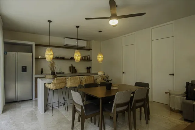 a view of a dining room with furniture