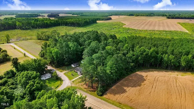 a view of swimming pool with a yard