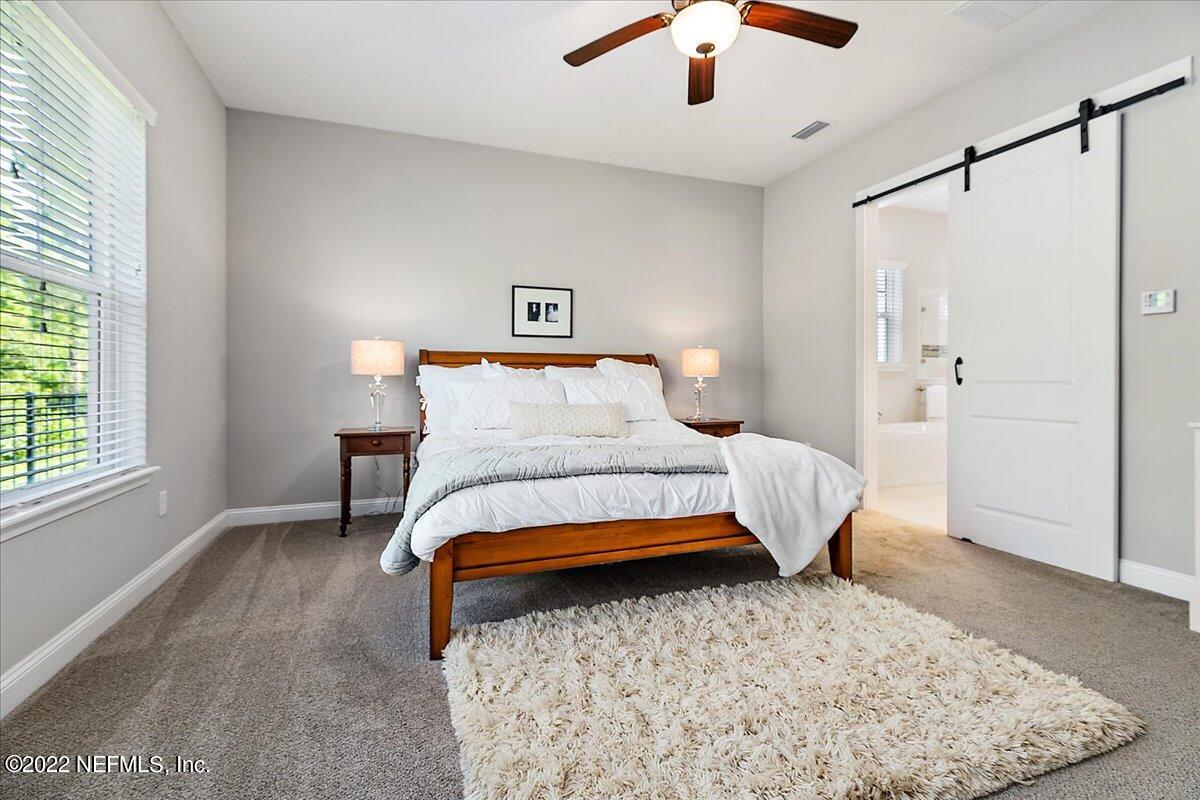 397 Glenneyre Circle St. Augustine, FL 32092 - Photo 14 of 34 Primary Suite
