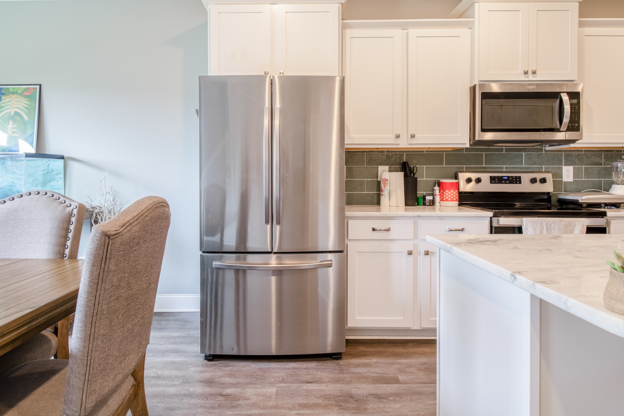 628 Bella Court Lebanon, TN 37087 - Photo 18 of 56 a kitchen with stainless steel appliances a refrigerator stove microwave and sink