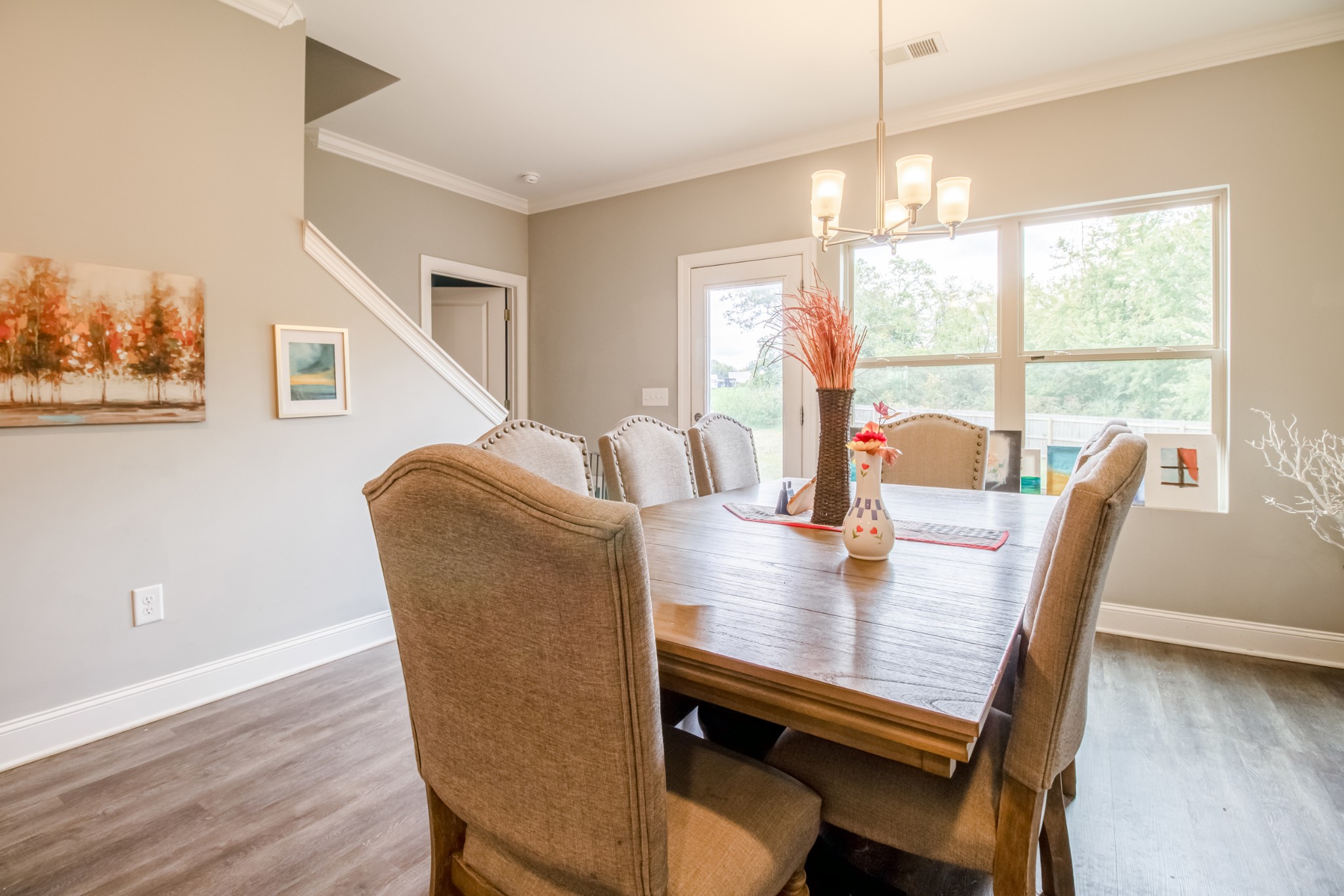 628 Bella Court Lebanon, TN 37087 - Photo 23 of 56 a view of a dining room with furniture window and wooden floor