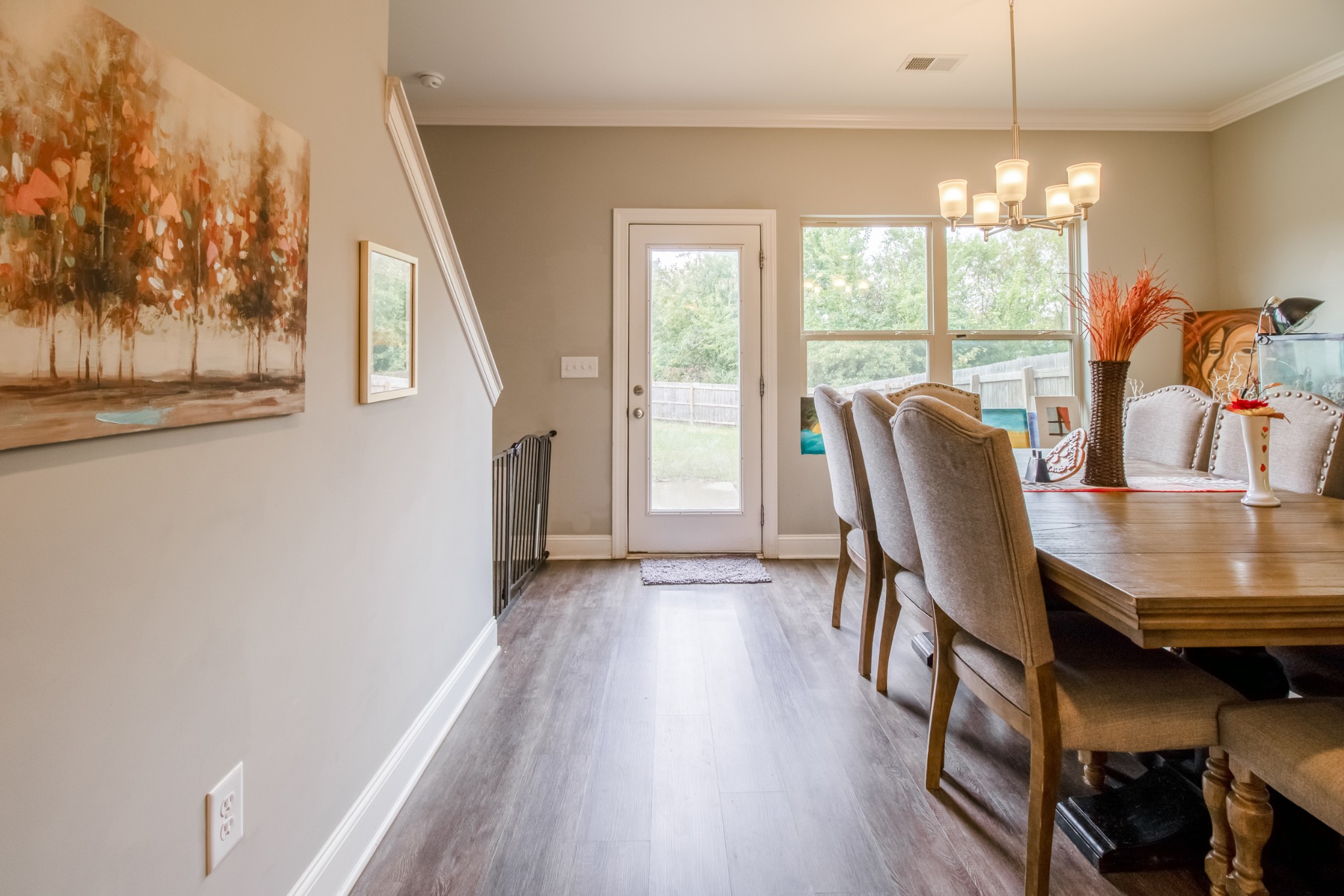 628 Bella Court Lebanon, TN 37087 - Photo 24 of 56 a view of a dining room with furniture window and wooden floor