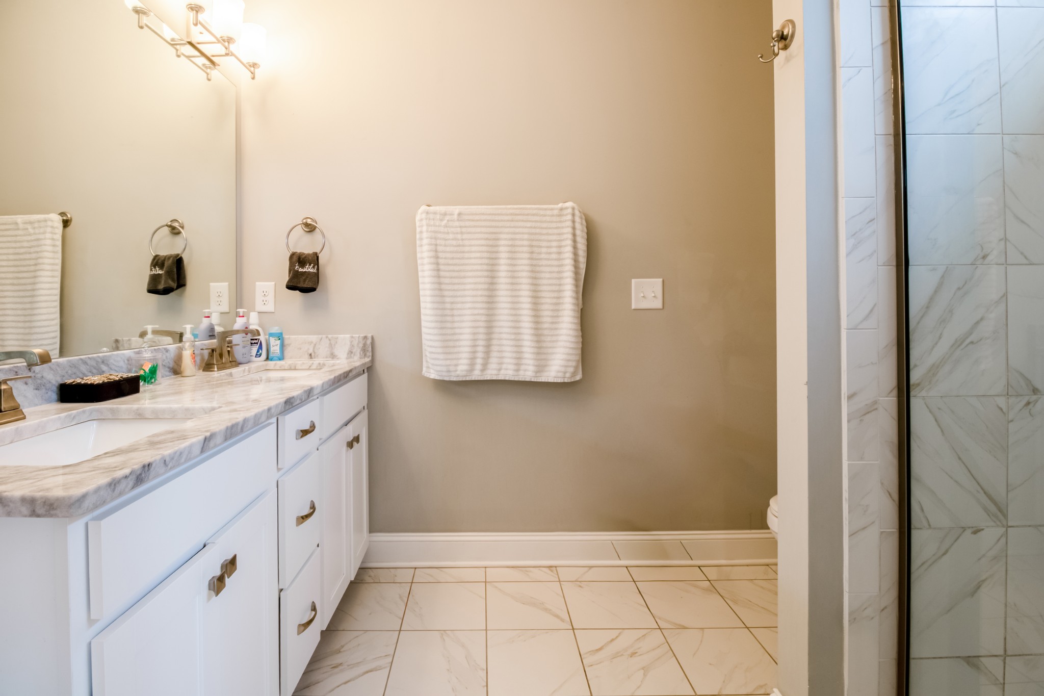 628 Bella Court Lebanon, TN 37087 - Photo 32 of 56 a bathroom with a sink and a mirror