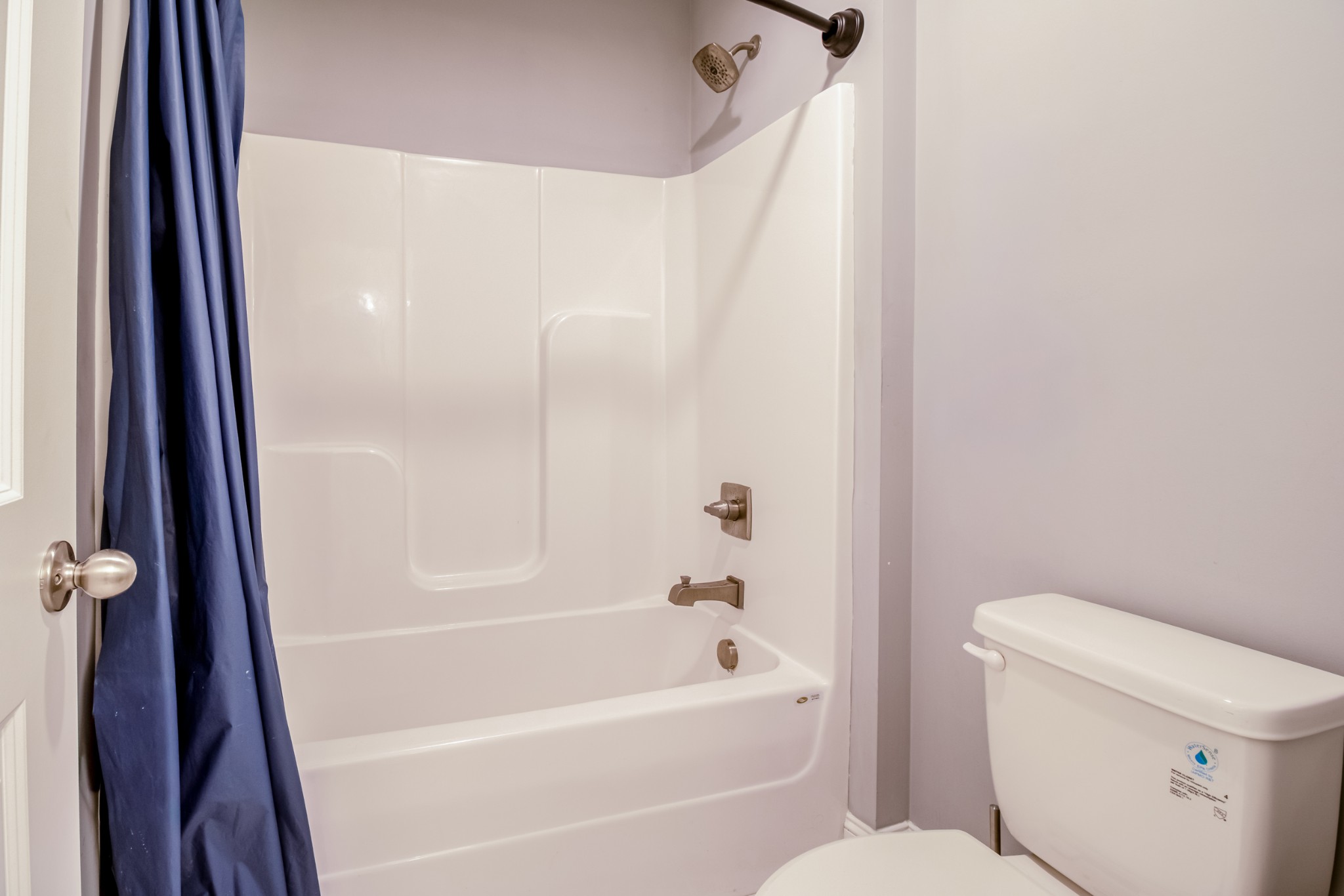 628 Bella Court Lebanon, TN 37087 - Photo 45 of 56 a bathroom with a bathtub and a toilet